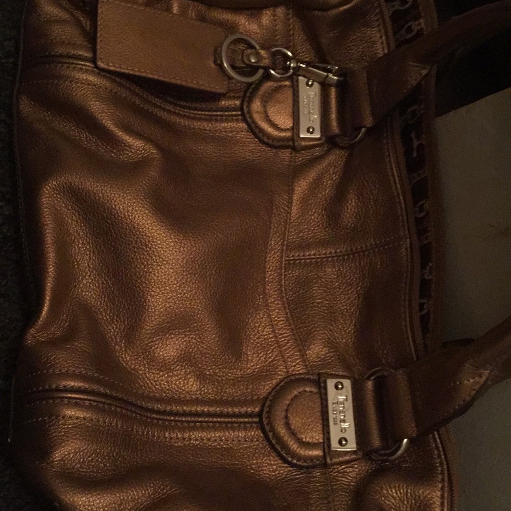 Gently used bronze color purse